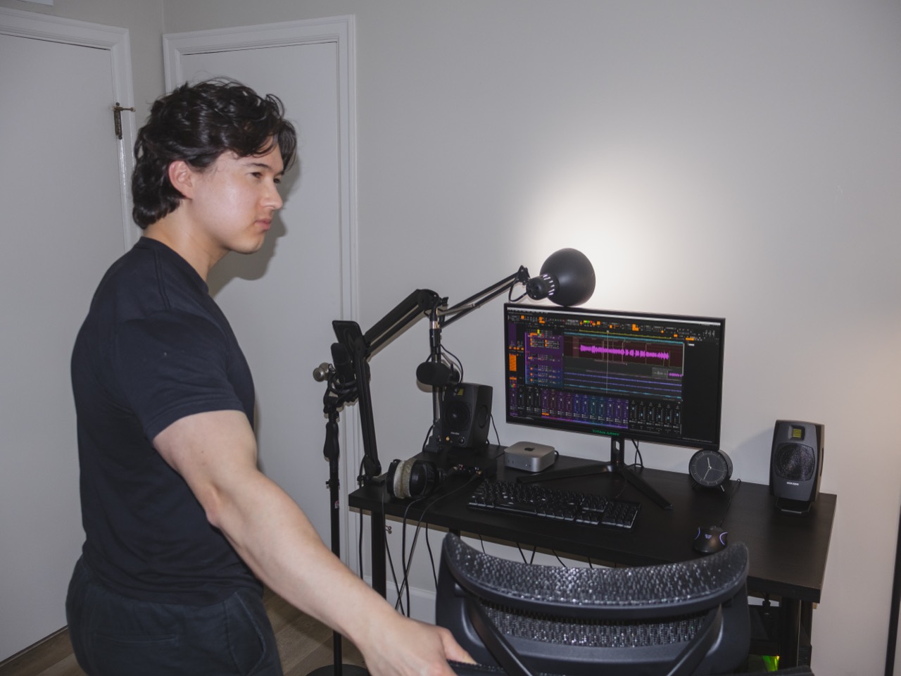Jason working in his home video and audio studio